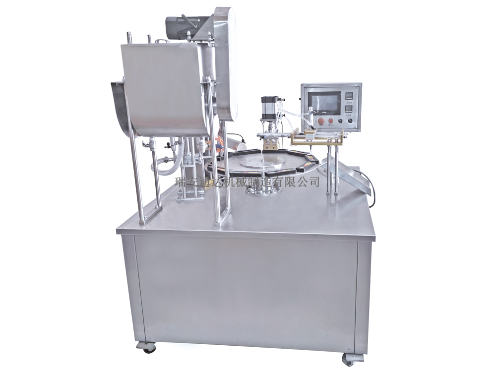 TD-7氣動轉盤式蜂蜜勺灌裝封口機
